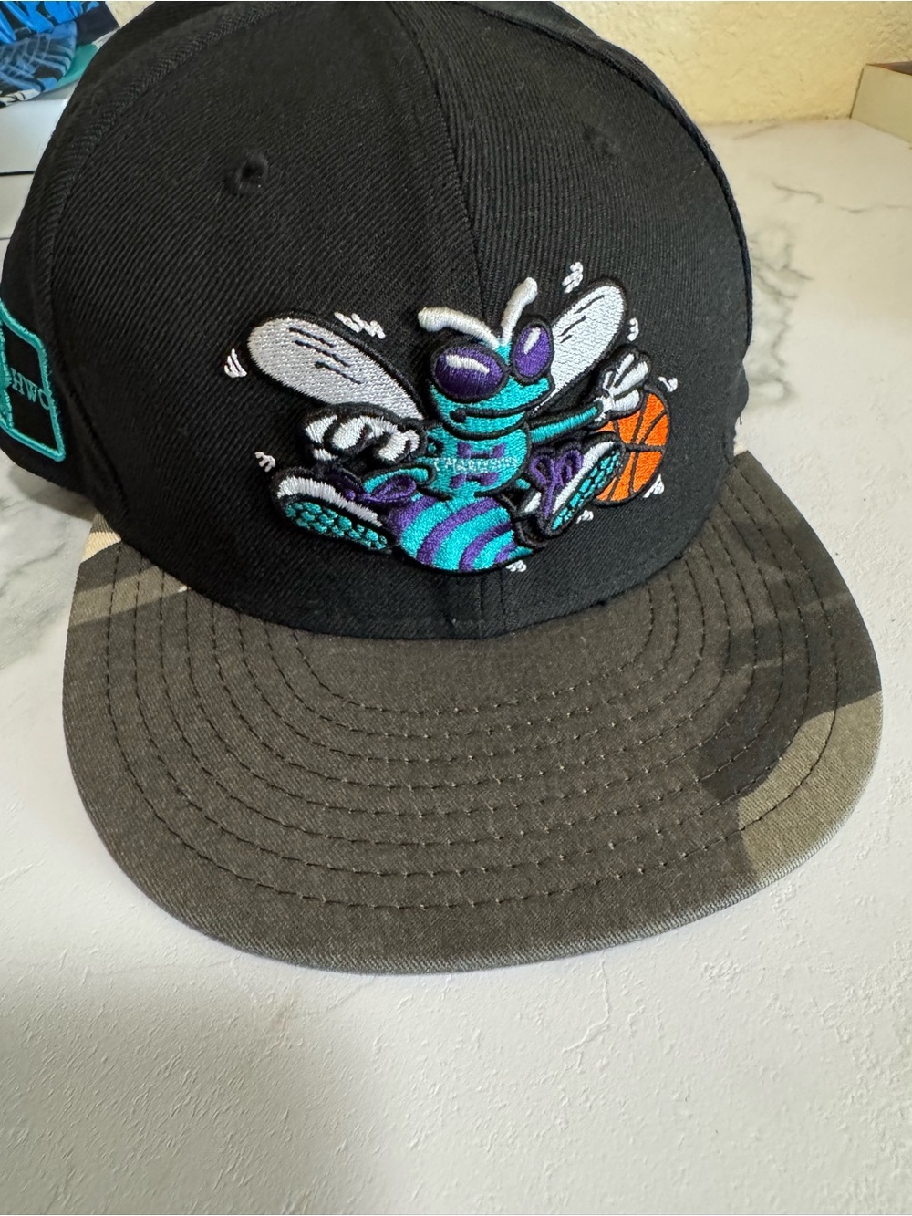 Men’s Black Fitted Hat with Teal & Purple Charlotte Hornets Camo